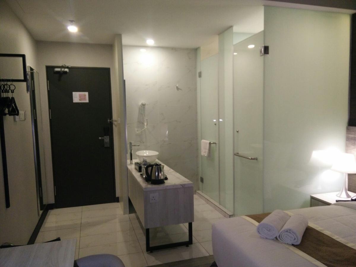 The Leverage Business Hotel Τζόχορ Μπάχρου Δωμάτιο φωτογραφία